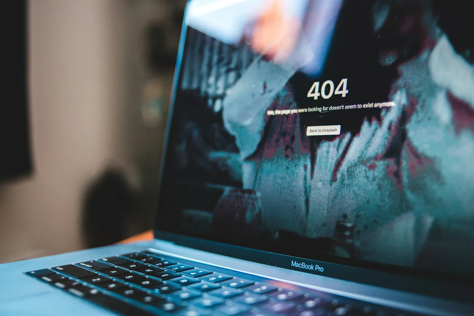 A laptop with a 404 error page